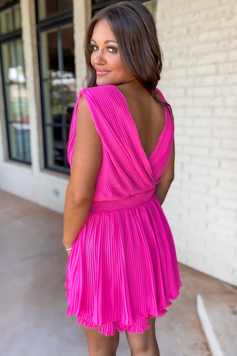 Fun And Flirty Hot Pink Pleated Surplice Neck Scrunchie Hems Romper Dress