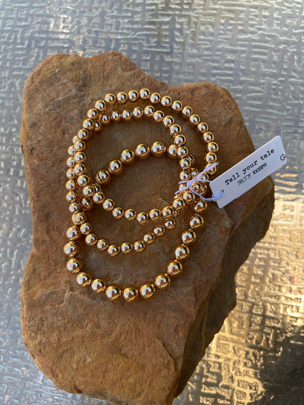 Set Of Three Gold Bracelets