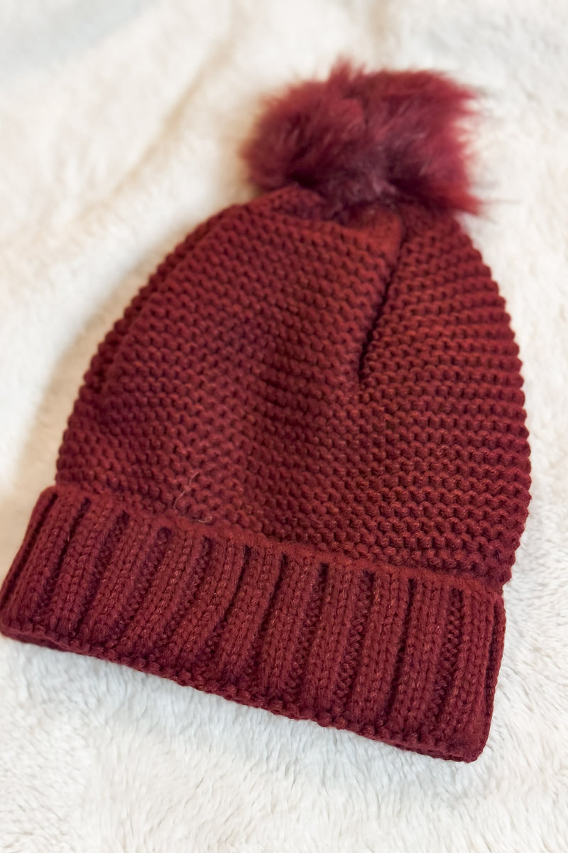 Pom Beanie in Burgundy with Faux Sherpa Lining