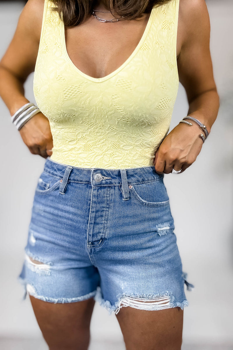 Light Denim Wash Junior Mom Fit Shorts With Frayed Hem & Side Slit