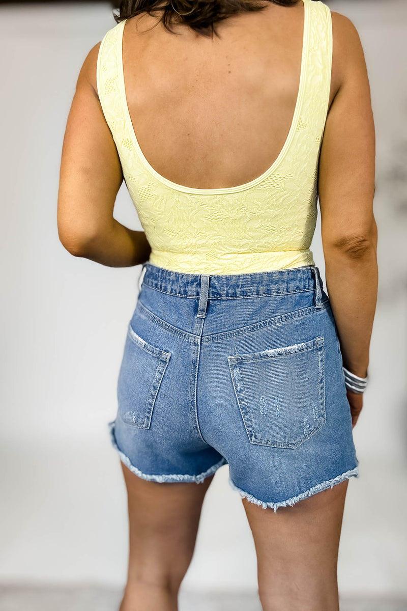 Light Denim Wash Junior Mom Fit Shorts With Frayed Hem & Side Slit